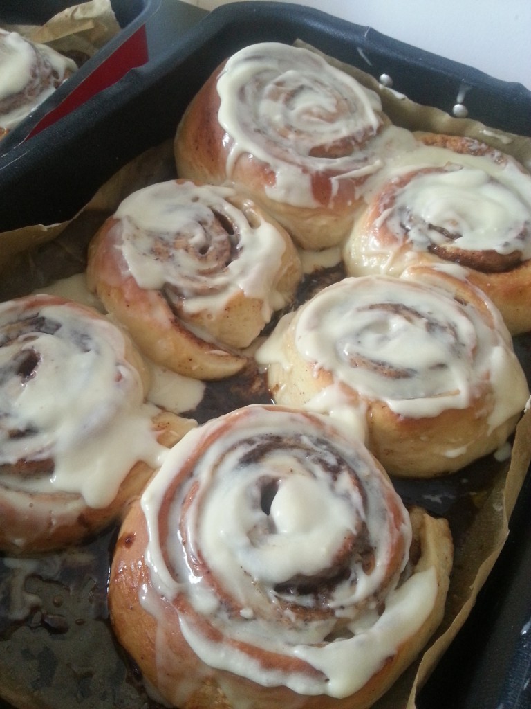 Straight from the oven pour half the icing, it will be all gooey